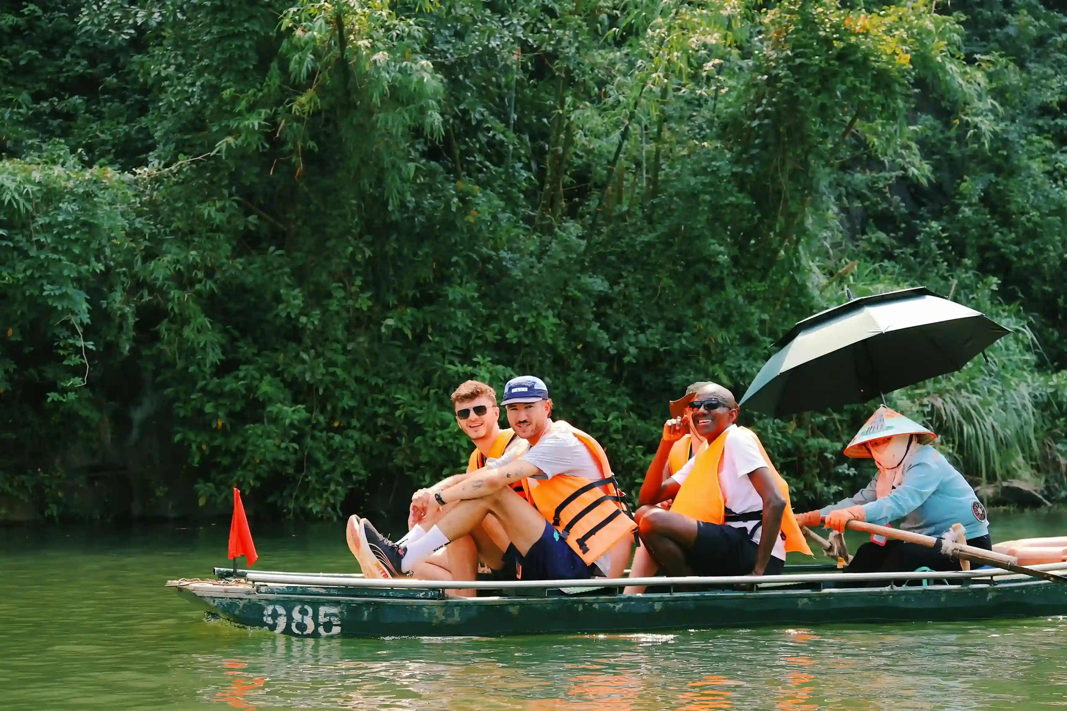 Group on a river boat in Ninh Binh