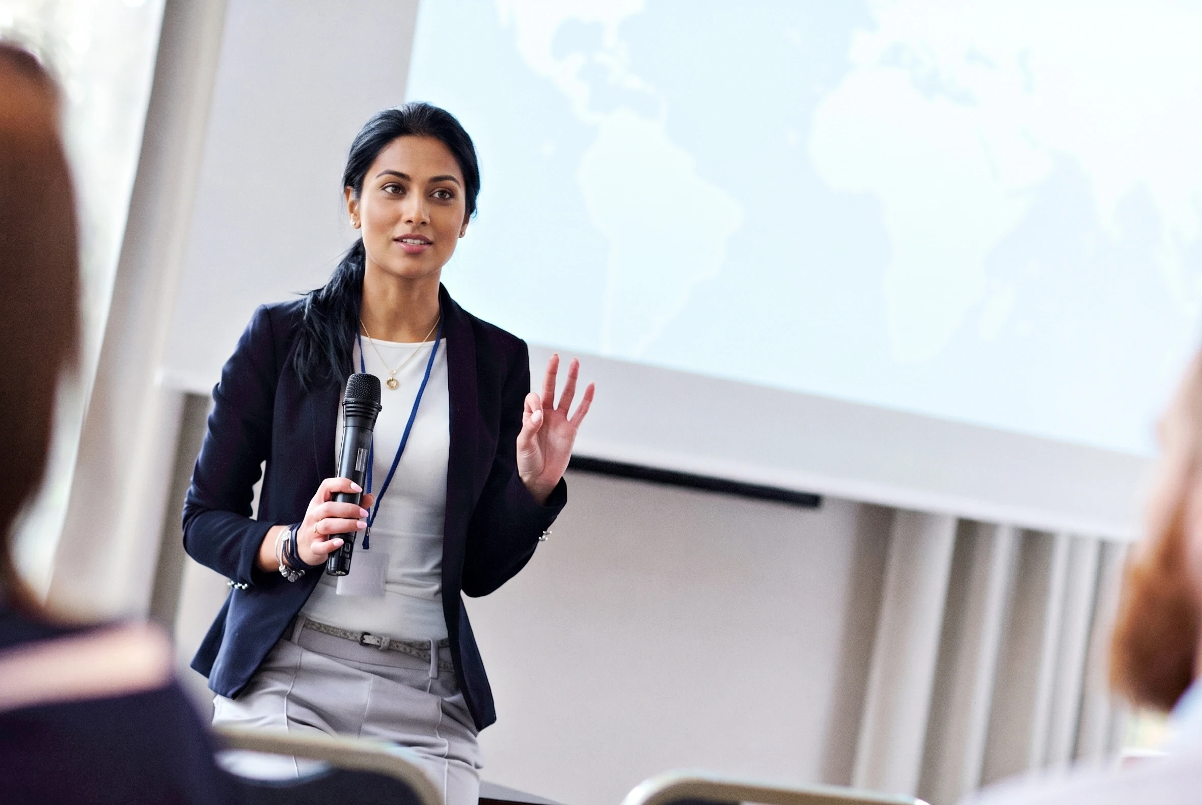 Host presenting at a corporate event