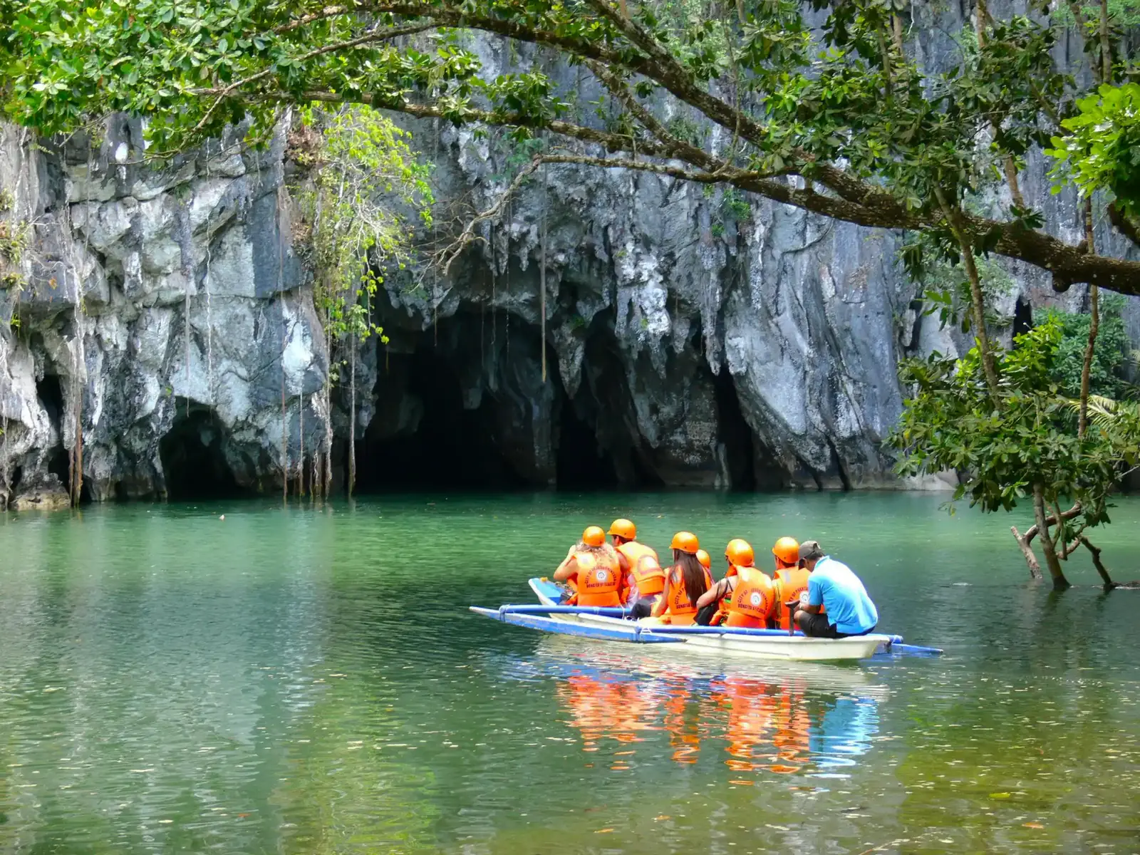 Boats at the limestone entrance to the Underground River, Puerto Princesa